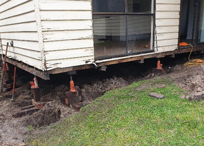 Restumping contractors working on house foundation and stump replacement